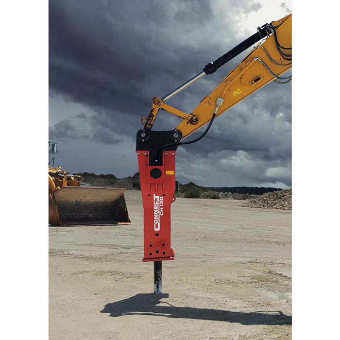 Red hydraulic breaker attached to a yellow excavator against a cloudy sky.