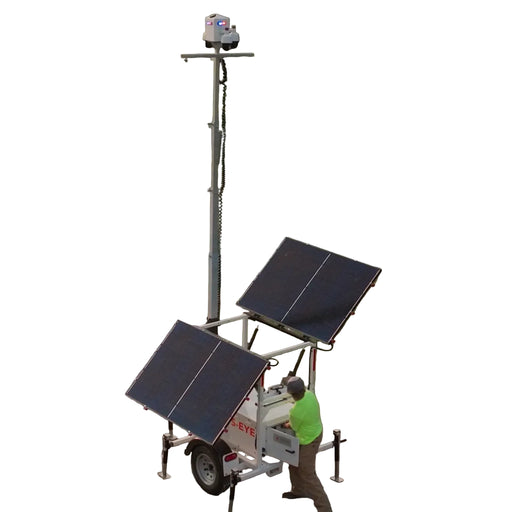 Solar-powered security camera with two large solar panels on a trailer, with a person operating it white background.