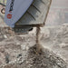 excavator digging into a pile of rock with a rockcrusher attachment